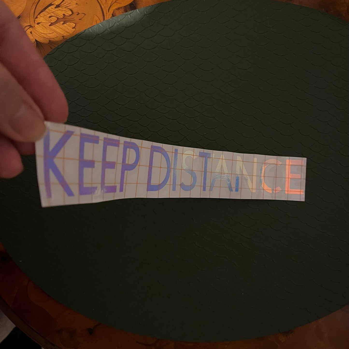 KEEP DISTANCE lettering